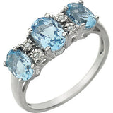 14K White 7x5mm Sky Blue Topaz & .02 CTW Diamond Ring